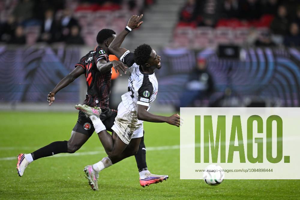 FC Midtjylland v Sint-Truidense VV - UEFA Conference League HERNING, DENMARK - OCTOBER 22 : Ndiaye Abdou Aziz defender of Midtjylland and Mbuku Nathanael forward of Sint-Truidense VV during the UEFA Conference League 2026 27 League Phase matchday 2 match between FC Midtjylland and Sint-Truidense VV on October 22, 2026 in Herning, Denmark, 22 10 2026 Herning Denmark