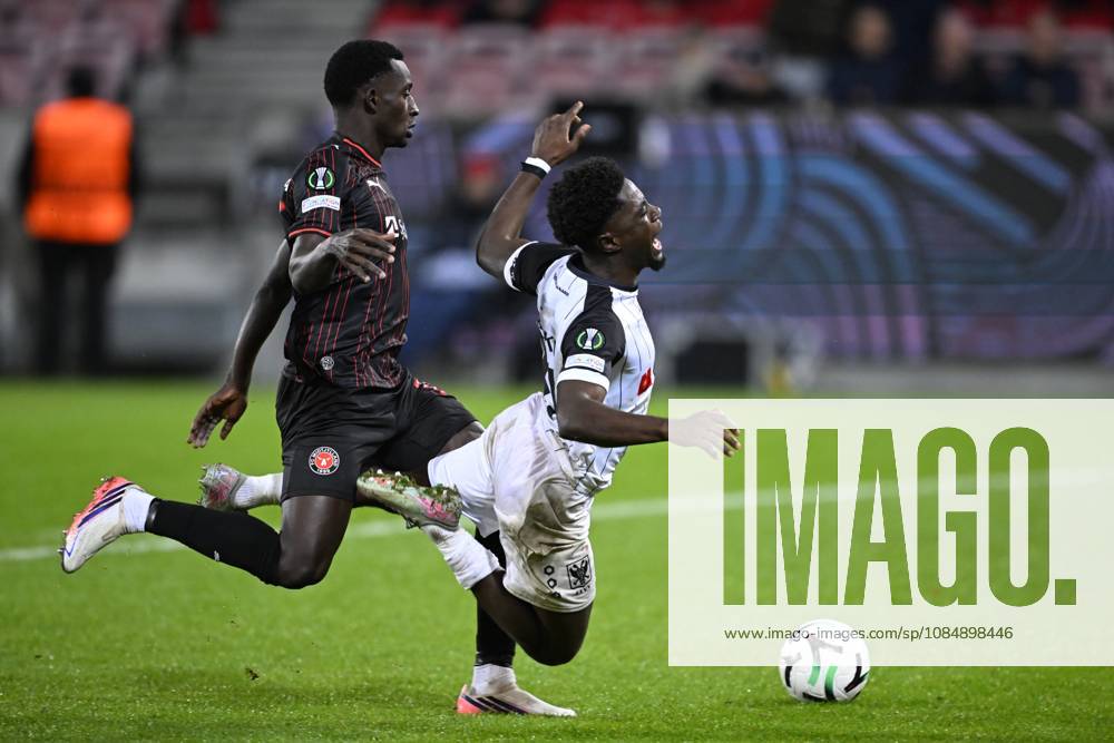 FC Midtjylland v Sint-Truidense VV - UEFA Conference League HERNING, DENMARK - OCTOBER 22 : Ndiaye Abdou Aziz defender of Midtjylland and Mbuku Nathanael forward of Sint-Truidense VV during the UEFA Conference League 2026 27 League Phase matchday 2 match between FC Midtjylland and Sint-Truidense VV on October 22, 2026 in Herning, Denmark, 22 10 2026 Herning Denmark