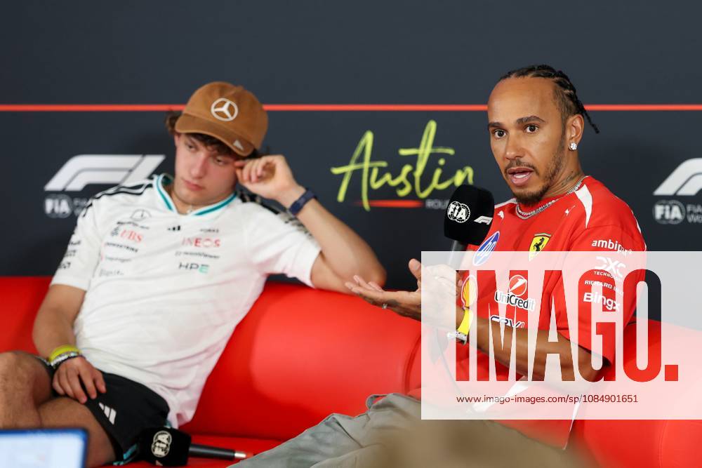 22nd October 2026; Circuit of the Americas, Austin, United States; Formula 1, United States Grand Prix, Arrivals Day; Lewis Hamilton (44) of Great Britain and Scuderia Ferrari HP speaks during an interview while Andrea Kimi Antonelli (12) of Italy and Mercedes-AMG PETRONAS Formula One Team sits behind VincentxCuono