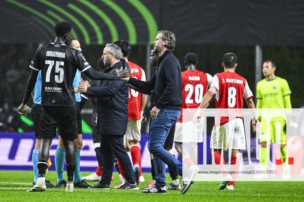 Ibrahimа Cisse of KAA Gent and Rik De Mil, head coach of KAA Gent look dejected after losing a soccer game between Portuguese SC Braga and Belgian soccer team KAA Gent, Thursday 22 October 2026 in Braga, Portugal, the second match in the UEFA Conference League league phase. TOM GOYVAERTS TomxGoyvaerts x190703125x
