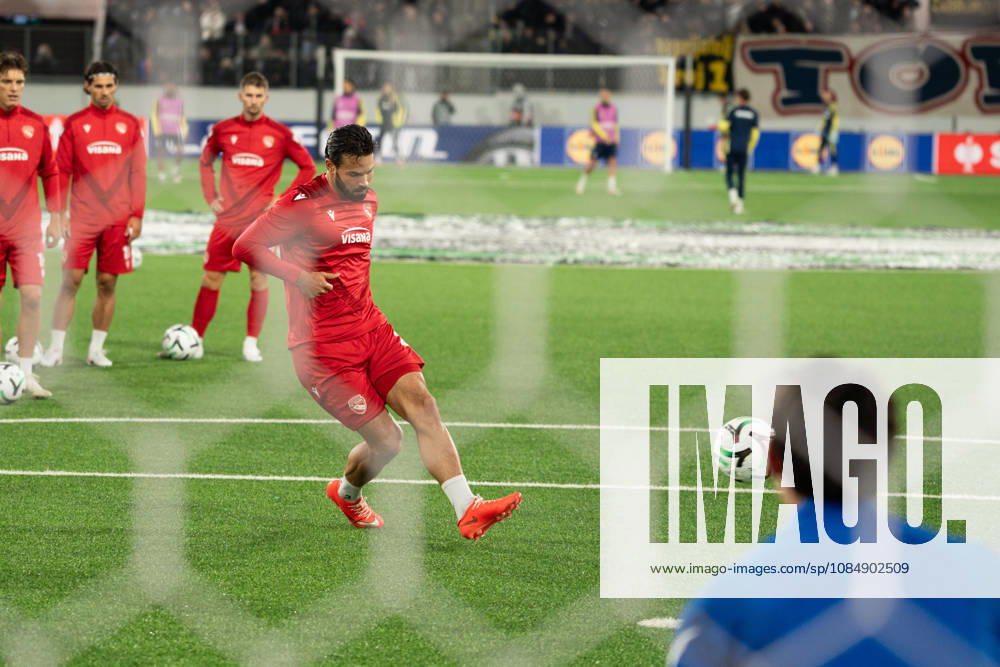 THUN, BERN - OCTOBER 22: Marco Bürki of FC Thun warms up before the UEFA Conference League match between FC Thun and HNK Hajduk Split at VISANA STADION on October 22, 2026 in Thun, Bern, Switzerland.