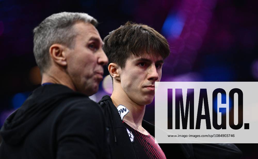 Netherlands Artistic Gymnastics World Championships 9271023 22.10.2026 Arsenii Dukhno of Team World Gymnastics Neutral Athletes 2 and his father and coach, Andrei Dukhno, are seen during the men s all-around final at the 2026 World Artistic Gymnastics Championships in Rotterdam, the Netherlands. Alexey Filippov Sputnik Rotterdam Netherlands