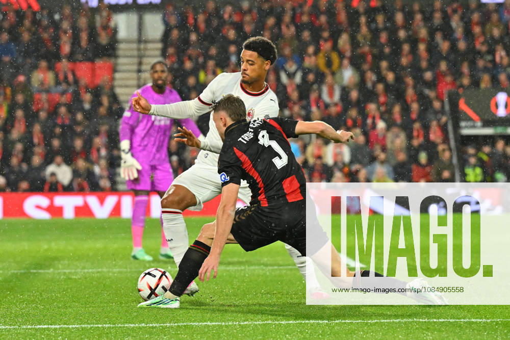 Bournemouth v AC Milan, Europa League Koni De Winter (5) of AC Milan battles for possession with Adrien Truffert (3) of AFC Bournemouth during the Europa League match between Bournemouth and AC Milan at the Vitality Stadium, Bournemouth, UK on 22 October 2026. Bournemouth Vitality Stadium Dorset UK Editorial use only ,