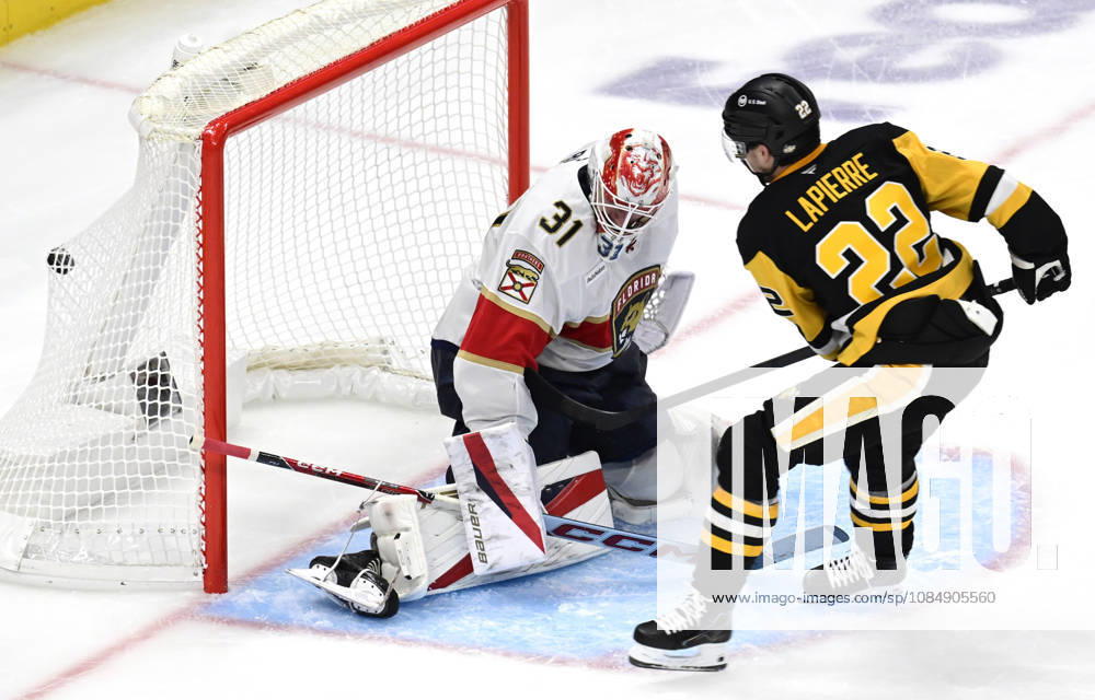 Pittsburgh Penguins center Hendrix Lapierre (22) shot finds the back of the net as he scores against Florida Panthers goalie Cooper Black (31) in the second period at PPG Paints Arena in Pittsburgh on Thursday, October 22, 2026. PIT2026102205 ARCHIExCARPENTER