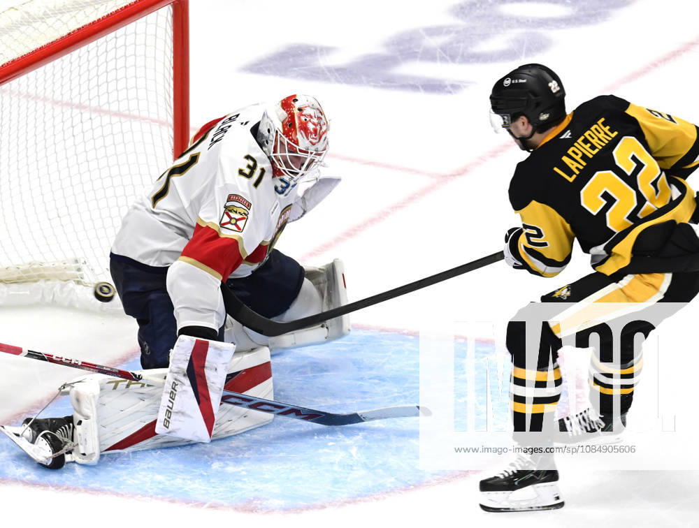 Pittsburgh Penguins center Hendrix Lapierre (22) shot finds the back of the net as he scores against Florida Panthers goalie Cooper Black (31) in the second period at PPG Paints Arena in Pittsburgh on Thursday, October 22, 2026. PIT2026102206 ARCHIExCARPENTER