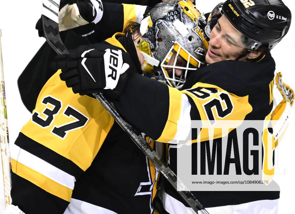 Pittsburgh Penguins goaltender Arturs Silovs (37) celebrates the Pittsburgh Penguins 4-0 win against the Florida Panthers with Pittsburgh Penguins left wing Andrei Kuzmenko (62) at PPG Paints Arena in Pittsburgh on Thursday, October 22, 2026. Pittsburgh Penguins goaltender Arturs Silovs (37) recorded 26 saves in the win. PIT2026102214 ARCHIExCARPENTER