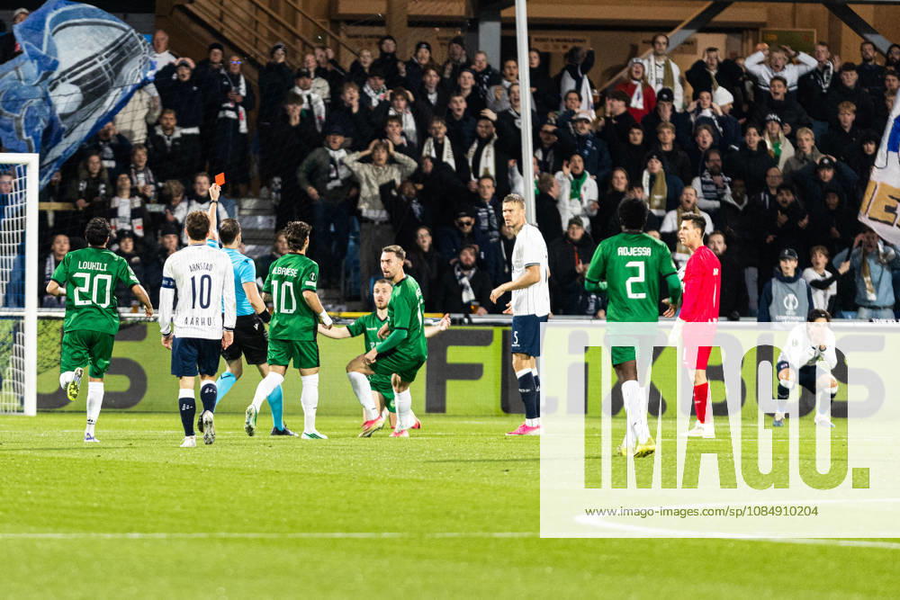 Aarhus GF v Egnatia, UEFA Conference League, Randers, Denmark Randers, Denmark. 22nd, October 2026. Referee Ante Culina hands out a red card to Eric Kahl of Aarhus GF during the UEFA Conference League match between Aarhus GF and Egnatia at Randers Stadion in Randers. Denmark, Randers, Cepheus Park Randers