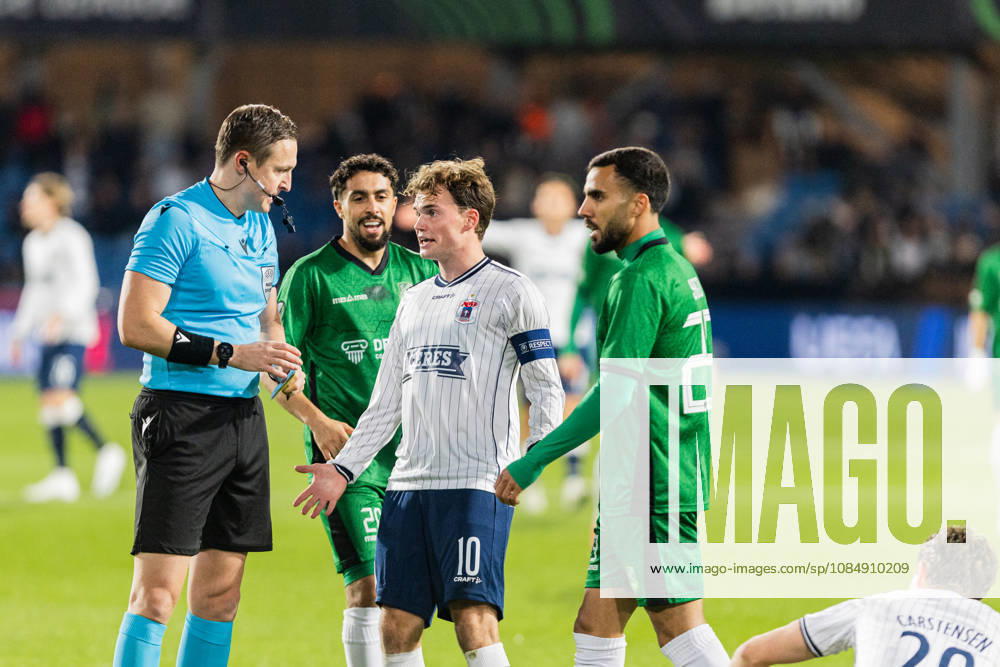 Aarhus GF v Egnatia, UEFA Conference League, Randers, Denmark Randers, Denmark. 22nd, October 2026. Referee Ante Culina seen with Kristian Arnstad (10) of Aarhus GF during the UEFA Conference League match between Aarhus GF and Egnatia at Randers Stadion in Randers. Denmark, Randers, Cepheus Park Randers