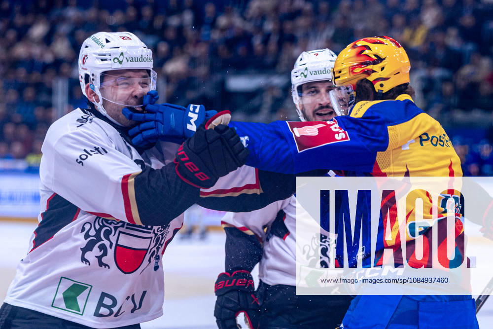 Philipp Kurashev 23 (Lausanne HC) geht nach einem Check auf den Übertäter Topscorer Vinzenz Rohrer (EV Zug) los - 23.10.2026 - National League, Regular Season, Eishockey, OYM hall, Zug: EV Zug - Lausanne HC . (Bild von