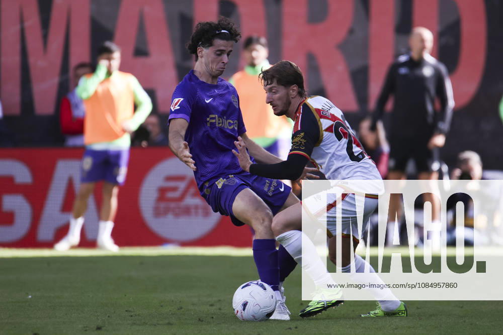 Rayo Vallecano v Espanyol - La Liga EA Sports 2026 27 October 24, 2026, Vallecas Stadium, Madrid, Spain: Ivan Balliu of Rayo Vallecano is defended by Javier Morcillo of Elche during La Liga EA Sports match between Rayo Vallecano and Elche CF at Vallecas Stadium on October 24, 2026 in Madrid, Spain. Madrid Vallecas Stadium Madrid Spain