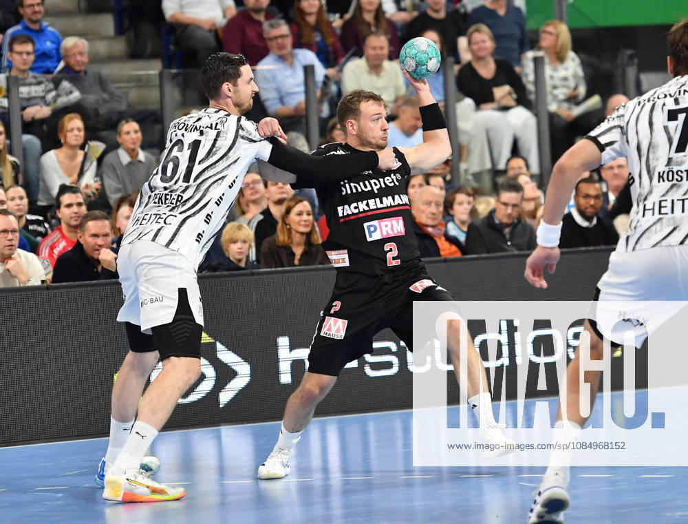 2 - Handball - 1. Bundesliga DAIKIN HBL - Saison 2026 2027 - 10. Spieltag: HC Erlangen Metropolregion Nürnberg HCE - THW Kiel - OGo - - Hendrik Pekeler (61, THW Kiel) Frieder Bandlow (2, HC Erlangen HCE )