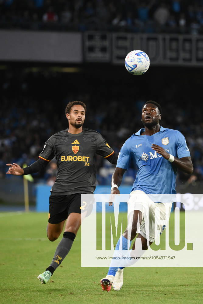 SSC Napoli v AS Roma - Serie A NAPLES, ITALY, OCTOBER 24: Napoli s Benoit Badiashile (R) eyes the ball flanked by Roma s Devyne Rensch during the Italian serie A football match between Napoli and Roma at Diego Armando Maradona stadium in Naples, Italy, on October 24, 2026. Isabella Bonotto Anadolu Naples Italy. Editorial use only. Please get in touch for any other usage.