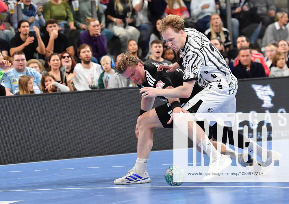 2 - Handball - 1. Bundesliga DAIKIN HBL - Saison 2026 2027 - 10. Spieltag: HC Erlangen Metropolregion Nürnberg HCE - THW Kiel - OGo - - Maciej Gebala (77, HC Erlangen HCE ) Eric Johansson (21, THW Kiel)