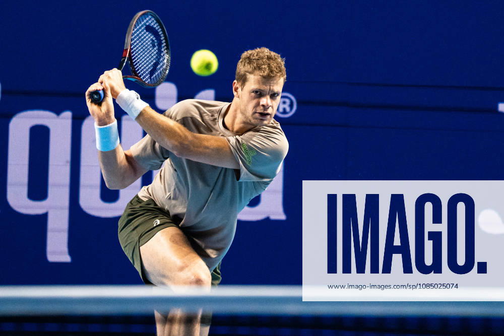 Yannick Hanfmann of Germany plays a backhand against Rinky Hijikata of Australia during the Swiss Indoors Basel Day 2 at St. Jakobshalle on October 25, 2026 in Basel, Switzerland.