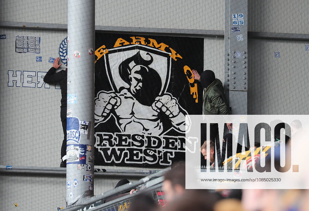 Dresdner Fans kleben Banner an die Wand Fussball, Herren, Saison 2026 2027, 2.BL, Holstein Stadion, Holstein Kiel gegen Dynamo Dresden DFL REGULATIONS PROHIBIT ANY USE OF PHOTOGRAPHS AS IMAGE SEQUENCES AND OR QUASI-VIDEO.