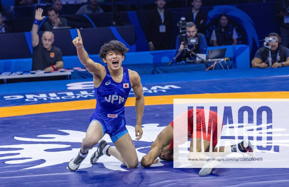 KOTO GOMI of Japan celebrates winning the gold medal in the men s Greco-Roman 60kg competition at the Senior World Wrestling Championships. Astana Kazakhstan - ZUMAt172 20261025_zip_t172_018