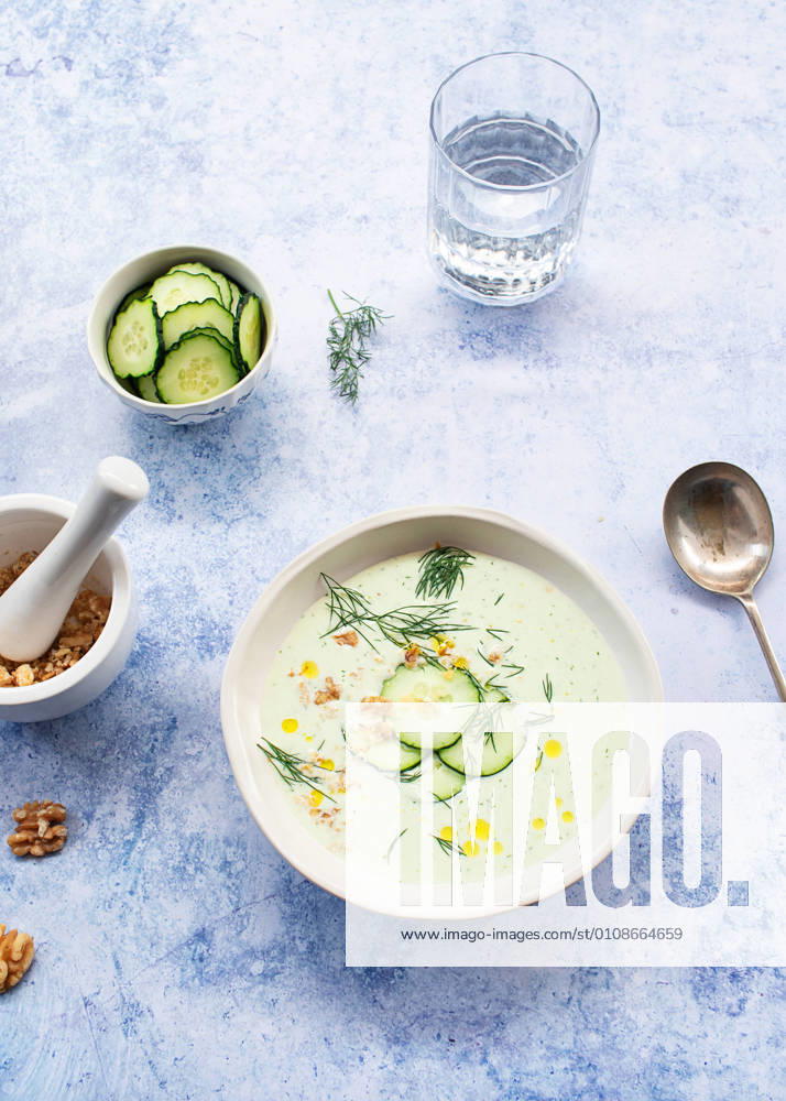 From above cold cucumber and dill soup named Tarator on rustic table