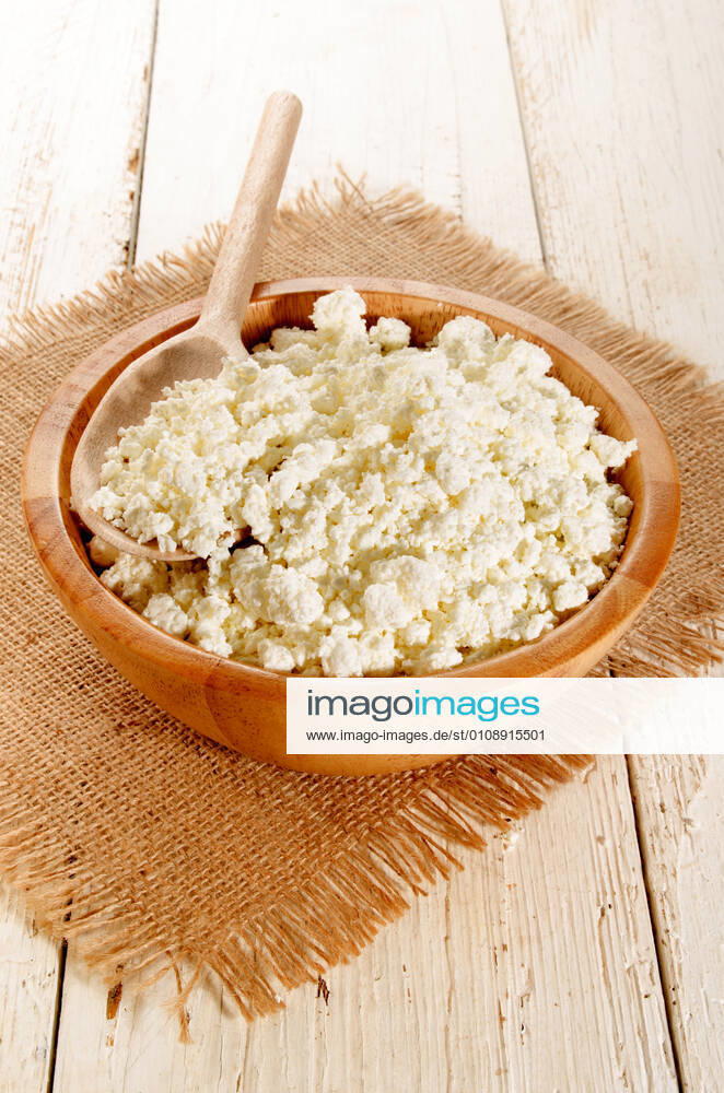 Home made cottage cheese with wooden spoon in a wooden bowl fresh home made cottage cheese with wooden spoon in a wooden bowlwhite, food, cheese, curd, healthy, diet, soft, cottage, dairy, snack, natural, cottage cheese, calcium, fresh, raw, sour, organic, cream, spoon, wooden spoon, jute, bowl, wood, freshness, rustic, healthy food, nutrition, tasty, home made, taste,