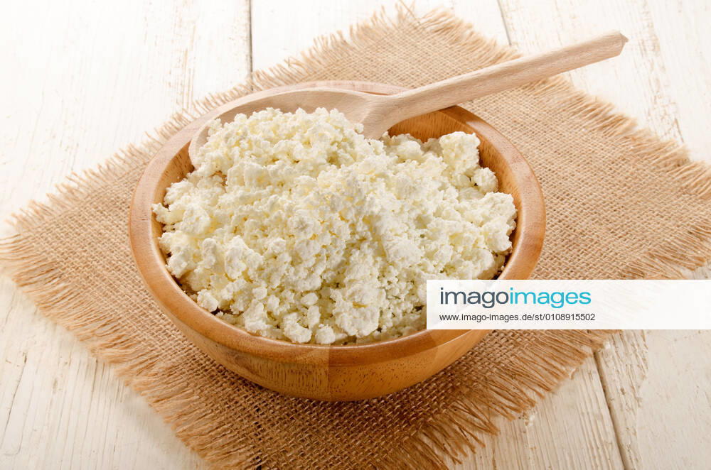 Home made cottage cheese with wooden spoon in a wooden bowl fresh home made cottage cheese with wooden spoon in a wooden bowlwhite, food, cheese, curd, healthy, diet, soft, cottage, dairy, snack, natural, cottage cheese, calcium, fresh, raw, sour, organic, cream, spoon, wooden spoon, jute, bowl, wood, freshness, rustic, healthy food, nutrition, tasty, home made, taste,