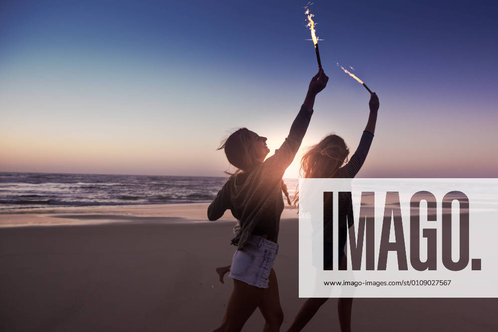 Beach Party Teenage friends running on a beach with fireworks, model releasedgirls, running, beach, fireworks, friends, group, teens, sparklers, young, party, women, holding, party, twinkle, teenagers, enjoy, fun, shine, sunset, night, hangout, celebrate, people, new, year, outdoors, rocketry, run, celebrating, summer, enjoying, happy, holiday, free, celebration, happiness, joy, vacation, leisure, youth, cool, together, freedom, hands, playful, playing, female,