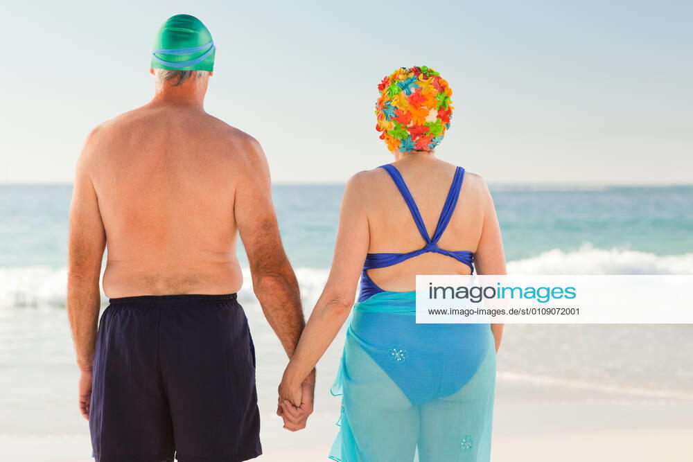 Senior couple at the beach Senior couple at the beach, model releasedattractive, background, beach, belly, body, female, fit, fitness, girl, health, healthy, hot, isolated, legs, lingerie, ocean, sea, skin, sky, smile, sport, stomach, summer, sweet, swimsuit, swimwear, underwear, waist, water, woman, old, oldest, elderly, retirement, senior, mature, man, male, couple, husband, wife,