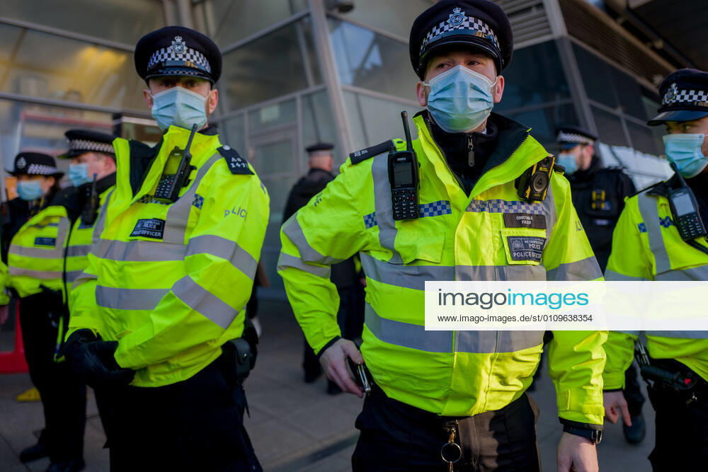 Metropolitan police officers swarmed Clapham Common in on Saturday after anti-lockdown protesters gathered in the area. Group of demonstrators chanting â€oetake your freedom back†walked along the high street. Few demonstrators was arrested by Metropolitan Police officers. England s third national lockdown has legally come into force last week. The lockdown means people are able to leave their homes for limited reasons, with measures expected to stay in place until mid-February. London UK - ZUMAg173 20210109_zap_g173_014