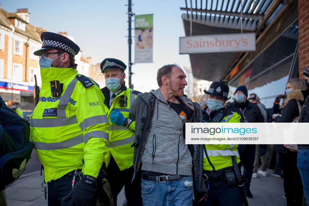 Man was arrested and taken to a police van in Clapham Common London UK - ZUMAg173 20210109_zap_g173_016