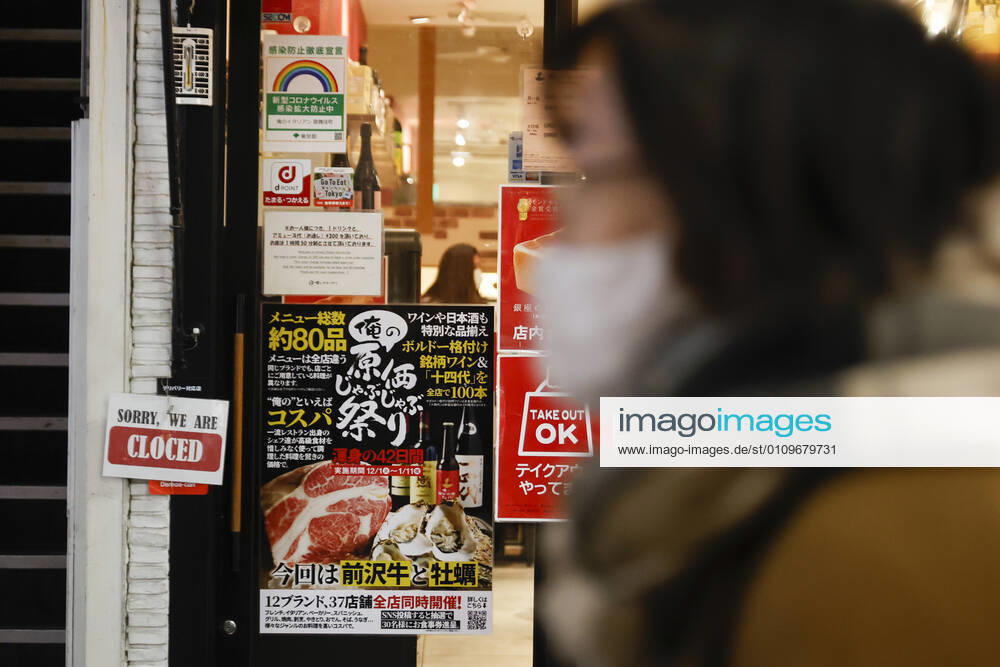 A woman wearing a face mask leaves Kabukicho (the red-light district of Tokyo) after the establishments closed at 8 pm to stop the COVID-19 infections in the capital. Tokyo reported 1,494 new COVID-19 cases on January 10; following four days of over 2,000 cases, the daily infections count dropped for the first time after the state of emergency was declared in Tokyo, Kanagawa, Saitama, and Chiba prefectures. Tokyo Japan - ZUMAm191 20210110_zap_m191_018