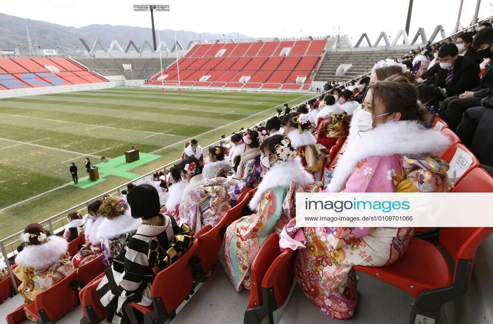 Coming-of-age ceremony under virus state of emergency People wearing face masks attend a coming-of-age ceremony at Hanazono Rugby Stadium in Higashiosaka, western Japan, on Jan. 11, 2021, amid the coronavirus pandemic.