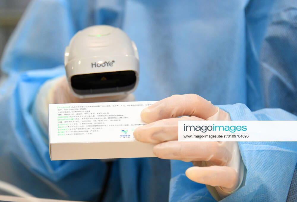 (210111) -- BEIJING, Jan. 11, 2021 -- A medical worker scans a dose of COVID-19 vaccine when preparing for inoculation at a temporary inoculation site in Haidian District in Beijing, capital of China, Jan. 11, 2021. Over 1 million people in Beijing had received the first dose of COVID-19 vaccine as of 11 a.m. Monday, the municipal health commission said. TO GO WITH Over 1 mln get COVID-19 vaccine in Beijing ) CHINA-BEIJING-COVID-19 VACCINE-1 MILLION-INOCULATIONS (CN) RenxChao