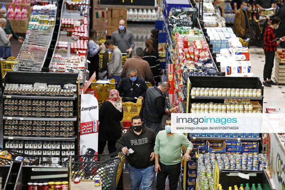 (210112) -- BEIRUT, Jan. 12, 2021 -- People shop at a supermarket to prepare for a national COVID-19 lockdown in Beirut, Lebanon, Jan. 11, 2021. Lebanon s Higher Defense Council declared on Monday a state of emergency between Jan. 14-25 that includes a total lockdown in hope to restrict further spread of COVID-19, Al-Jadeed local TV channel reported. ) LEBANON-BEIRUT-COVID-19-LOCKDOWN BilalxJawich