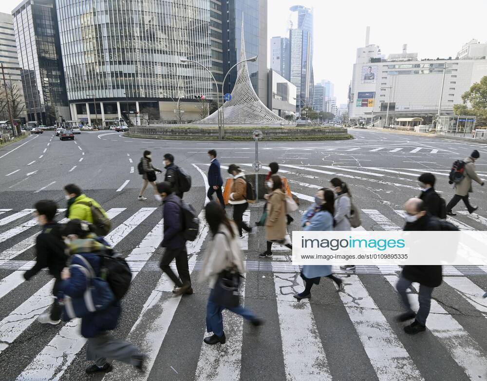 Day after Japan expands coronavirus emergency to 7 more prefectures People wearing face masks walk near JR Nagoya Station in the central Japan city on Jan. 14, 2021. Prime Minister Yoshihide Suga declared a state of emergency in seven additional prefectures, including Aichi, the previous day amid the continued spread of the novel coronavirus.