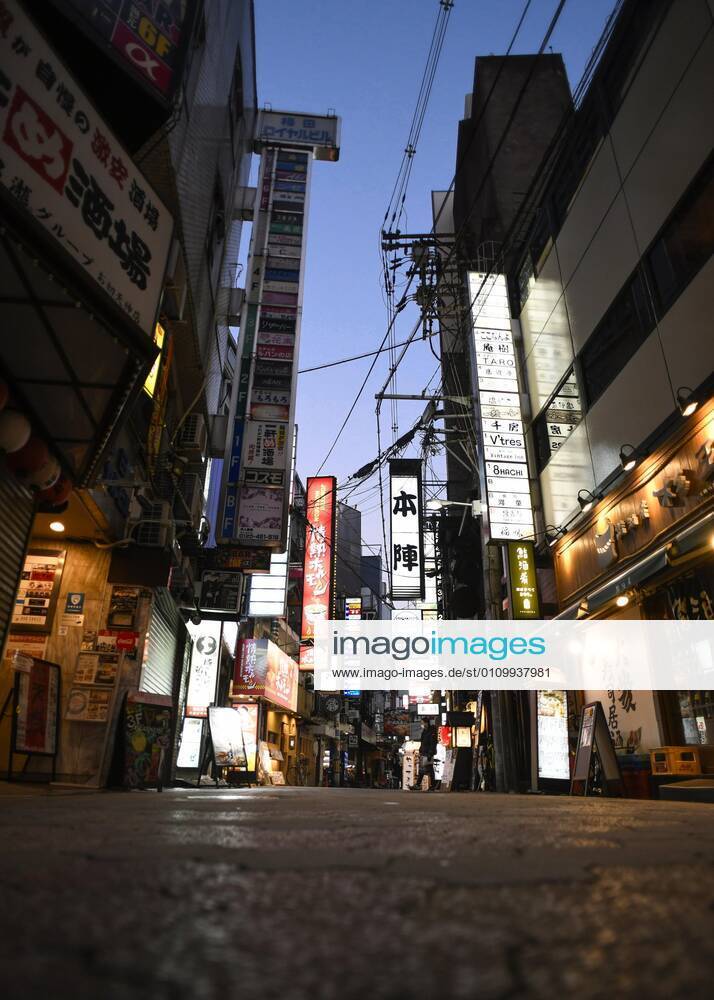 Day after Japan expands coronavirus emergency to 7 more prefectures A street lined with bars and restaurants is quiet in Osaka s Kita Ward on Jan. 14, 2021, a day after Japanese Prime Minister Yoshihide Suga declared a state of emergency in seven additional prefectures, including Osaka, amid the continued spread of the novel coronavirus.