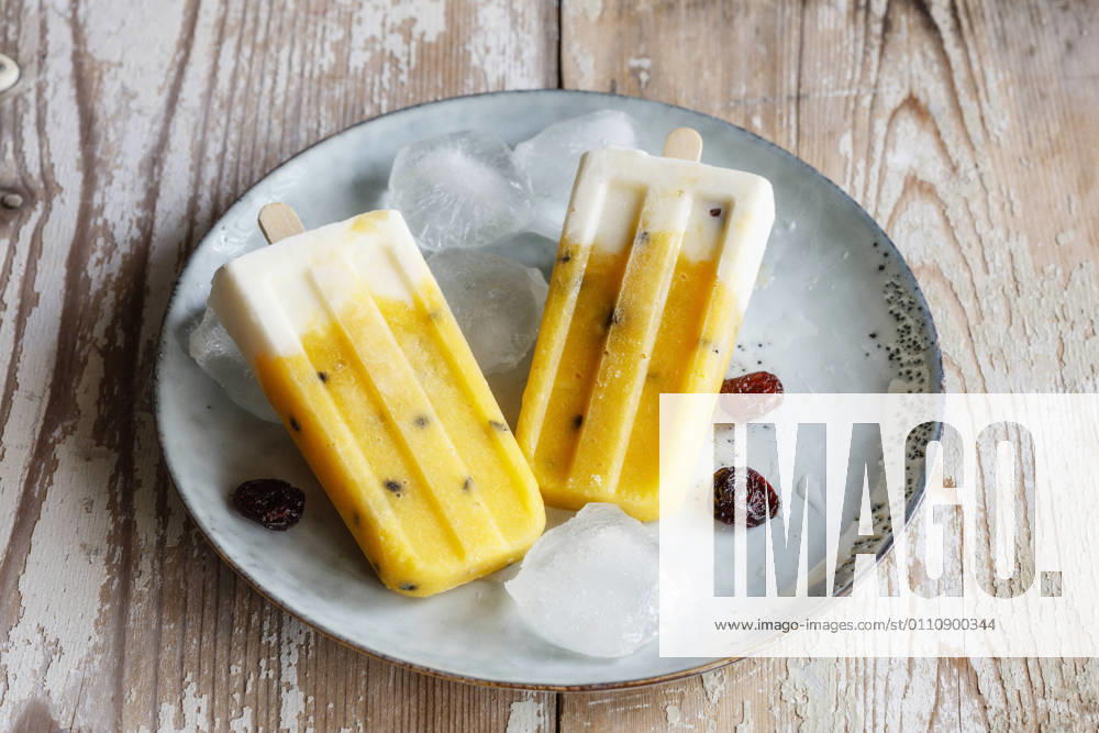 Homemade popsicles with mango and passion fruit EVGF03849