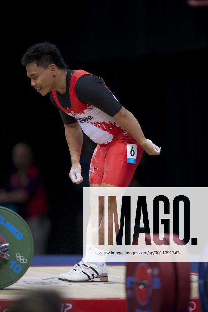 London, England, United Kingdom - EKO YULI IRAWAN (INA) celebrates completing a lift in the men s 62kg weightlifting competition at ExCeL in London. EKO won an Olympic Bronzemedal. Olympics 2012 - Weightlifting - ZUMAw10