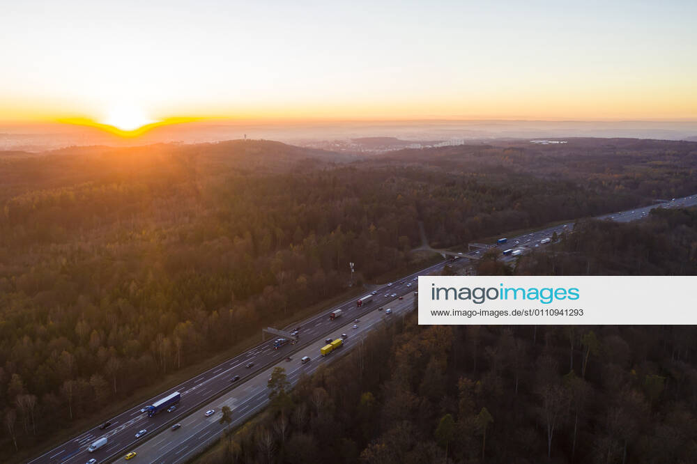 Germany, Baden-Wurttemberg, Stuttgart, Aerial view of traffic on Bundesautobahn 8 at sunset WDF06439