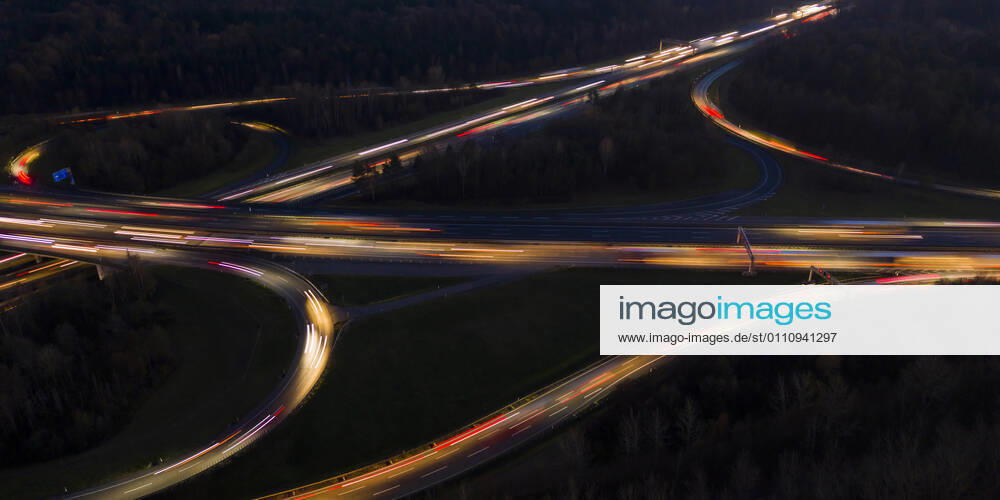 Germany, Baden-Wurttemberg, Stuttgart, Aerial view of vehicle light trails on Bundesautobahn 8 at night WDF06443