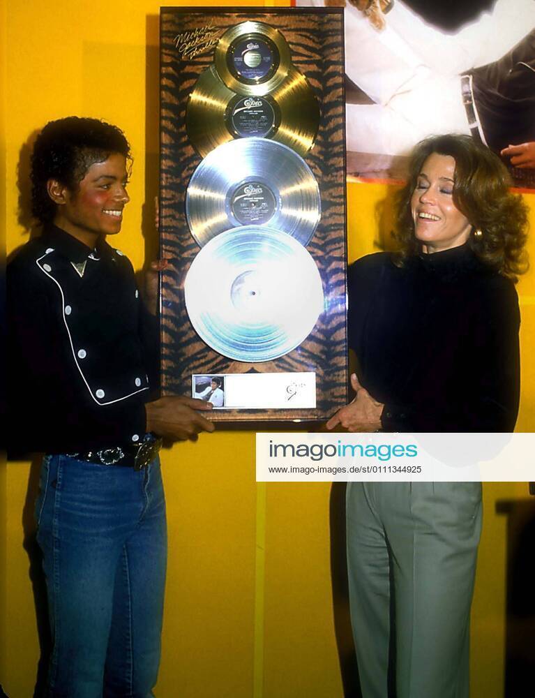 Michael Jackson and Jane Fonda at the Platinum status presentation for his Thriller album on February 25, 1983.
