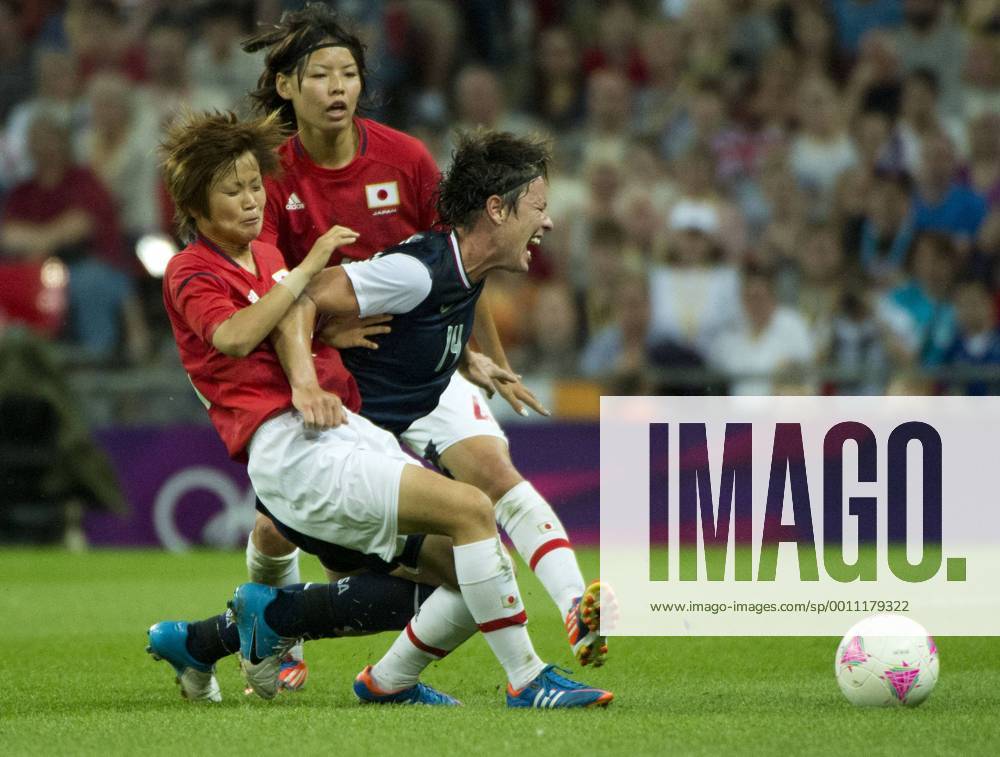 Aug. 9, 2012 - London, England, United Kingdom - ABBY WAMBACH goes against Japan players during the women s soccer gold medal match between the United States (USA) and Japan at London 2012 Olympic Games at Wembley Stadium. Olympics 2012 - Soccer - USA Defeats Japan 2-1 to Win Gold - ZUMAj89
