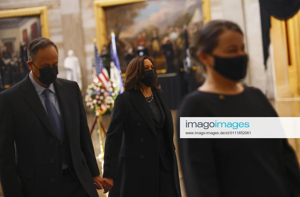 United States Vice President Kamala Harris and her husband Doug Emhoff pay their respects as the remains of Capitol Police officer Brian Sicknick lay in honor in the Rotunda of the U.S. Capitol building after he died on Jan. 7 from injuries he sustained while protecting the U.S. Capitol during the Jan. 6 attack on the building, in Washington, DC, U.S. February 3, 2021 Washington USA - ZUMAs152 20210203_zaa_s152_083