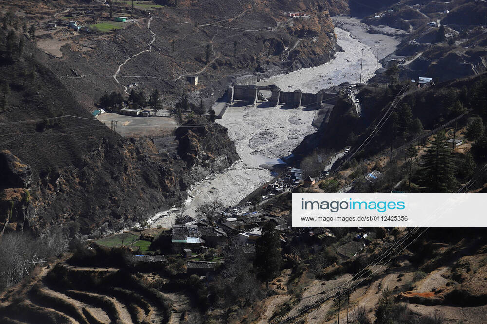 KW06 (210209) -- NEW DELHI, Feb. 9, 2021 -- Photo taken on Feb. 8, 2021 shows a view of a damaged dam near the Dhauliganga hydro power project after a glacier burst in Chamoli district in India s northern hilly state of Uttarakhand. As many as 24 dead bodies, all men, have been recovered in India s northern hilly state of Uttarakhand till Monday evening, an official at the local disaster management office said. (Str Xinhua) INDIA-UTTARAKHAND-GLACIER BURST Stringer