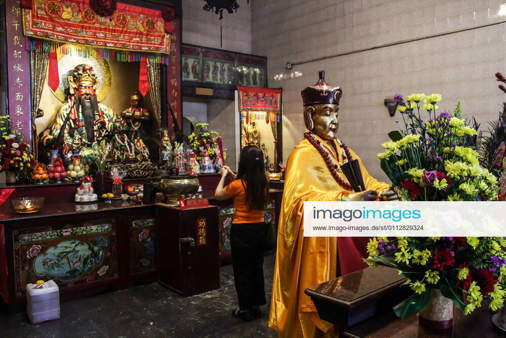 A woman prays at the Dharma Ramsi Temple during the Lunar New Year celebrations..The Lunar New Year, also known as Spring Festival, falls on 12 February 2021, marking the beginning of the Year of the Ox. Bandung Indonesia - ZUMAs197 20210212_zaa_s197_075