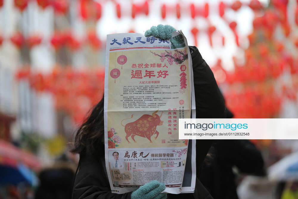A newspaper front page celebrating Chinese New Year is seen in Chinatown. The Lunar New Year marks the start of the Year of Ox. London United Kingdom - ZUMAs262 20210212_zip_s262_052