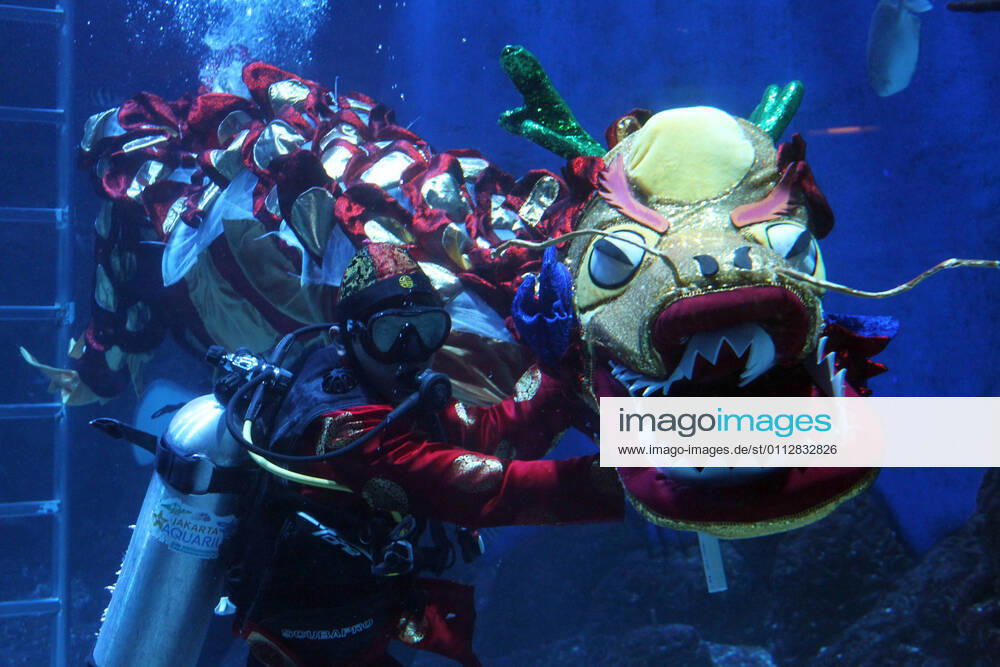 The Liong Show Underwater attraction with mermaids played by safety divers and free divers enlivened in celebration of Chinese New Year 2572 at the Jakarta Aquarium and Safari at the Neo Soho mall, Jakarta, on February 12,2021. The show was in order to enliven Chinese New Year and as a means of recreation for children and families where there was a concession from the government during the COVID-19 pandemic by implementing strict health protocols. Jakarta Indonesia - ZUMAr173 20210212_zip_r173_002