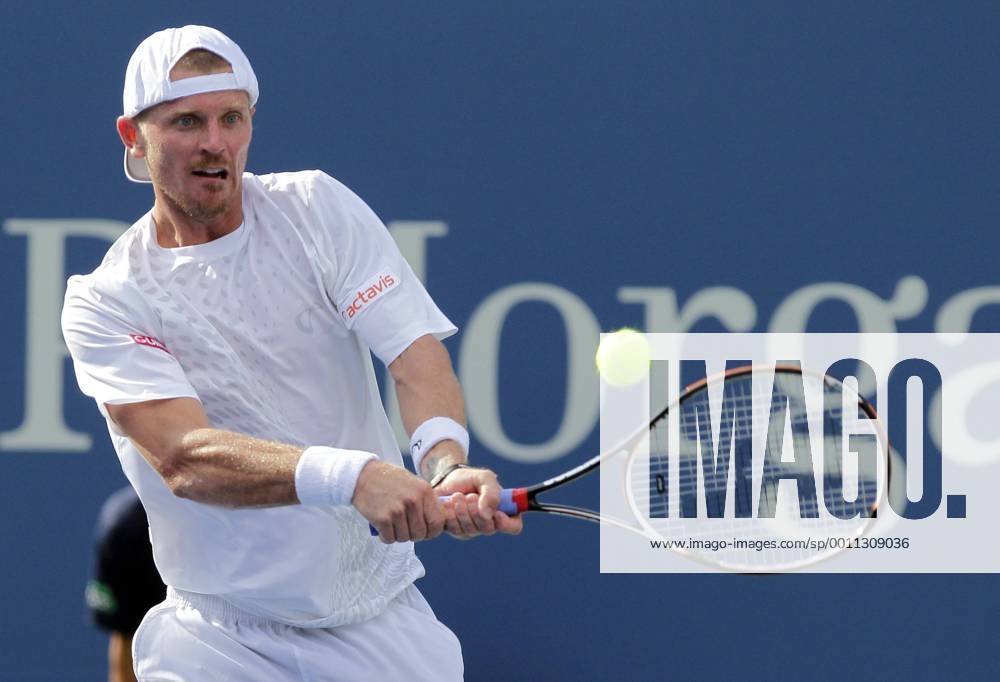 Alex Bogolomov (RUS) hits a backhand in first round match at the 2012 U.S. Open Tennis Championships in Arthur Ashe Stadium at the Billie Jean King National Tennis Center in New York City on August 27, 2012. NYP20120827101