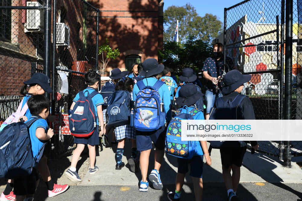 VICTORIA CORONAVIRUS COVID19, Students arrive to Carlton Gardens Primary school in Melbourne, Thursday, February 18, 2021. Victoria has recorded no new locally acquired coronavirus cases as life returns to COVID-normal after the state s five-day circuit breaker lockdown. ( NO ARCHIVING, , NO USE IN BOOKS WITHOUT CONSENT MELBOURNE VIC AUSTRALIA