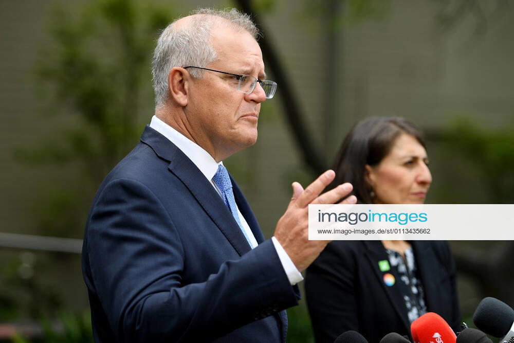 SCOTT MORRISON VACCINE HOSPITAL TOUR, Prime Minister Scott Morrison and NSW Premier Gladys Berejiklian address media following a tour of a COVID-19 vaccination hub at Royal Prince Alfred hospital in Sydney, Friday, February 19, 2021. The first COVID-19 vaccinations in NSW will take place on Monday, with the Pfizer jab to go out to frontline workers. ( NO ARCHIVING, , NO USE IN BOOKS WITHOUT CONSENT Sydney NSW AUSTRALIA