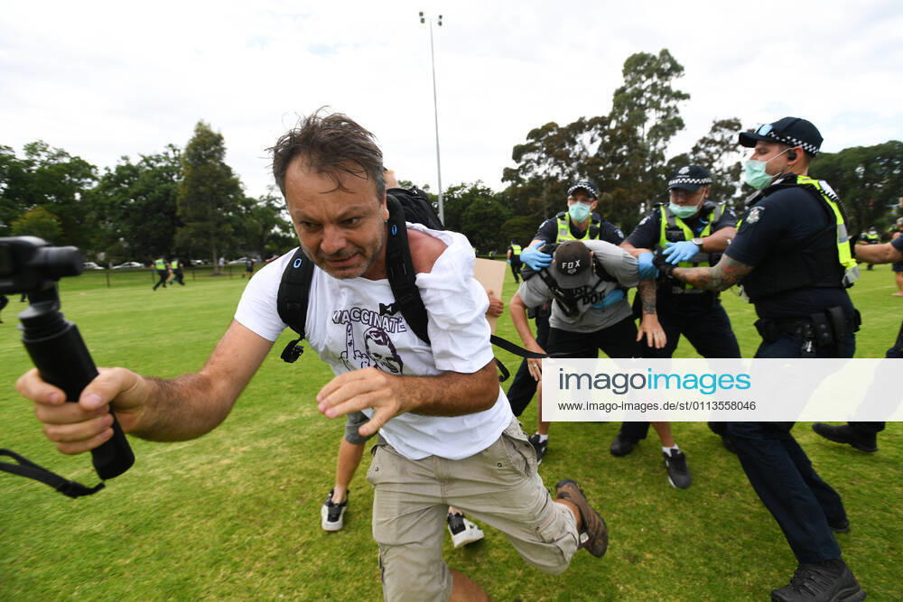 ANTI VACCINATION RALLY MELBOURNE, Police arrest a protester during an anti-vaccination rally in Melbourne, Saturday, February 20, 2021. The national rollout of the Pfizer vaccine will begin on Monday in what will be the largest exercise of its kind in Australia s history. ( NO ARCHIVING, , NO USE IN BOOKS WITHOUT CONSENT MELBOURNE VIC AUSTRALIA