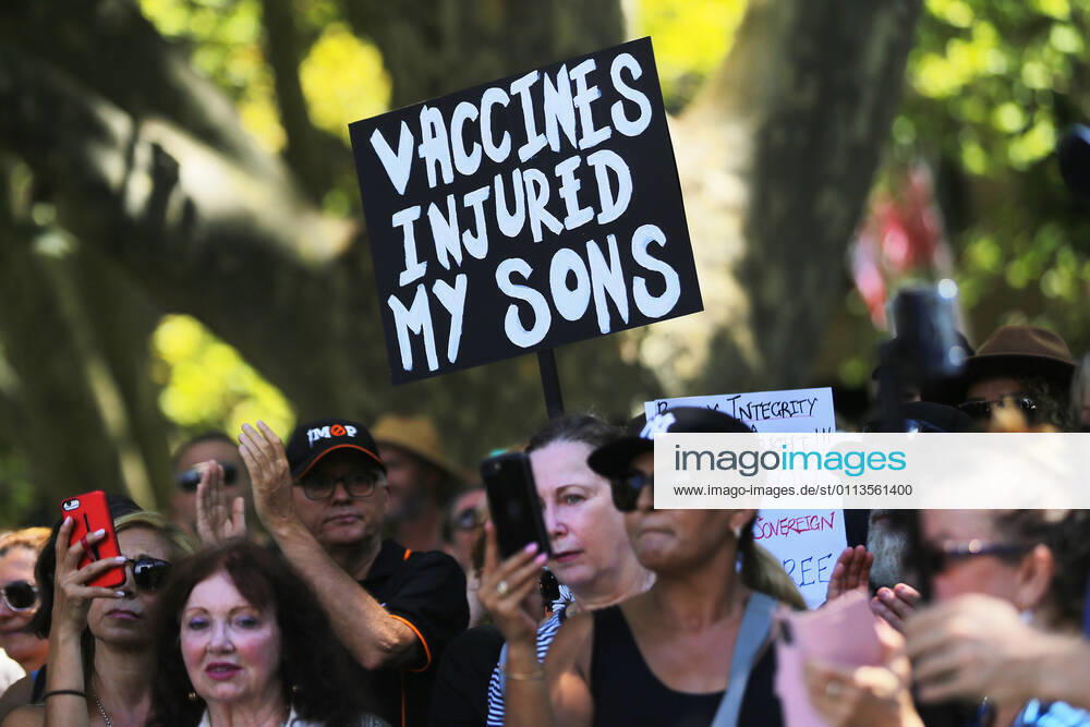 ANTI VACCINATION RALLY SYDNEY, People hold placards during an anti-vaccination rally in Sydney, Saturday, February 20, 2021. The national rollout of the Pfizer vaccine will begin on Monday in what will be the largest exercise of its kind in Australia s history. ( NO ARCHIVING, , NO USE IN BOOKS WITHOUT CONSENT SYDNEY NSW AUSTRALIA