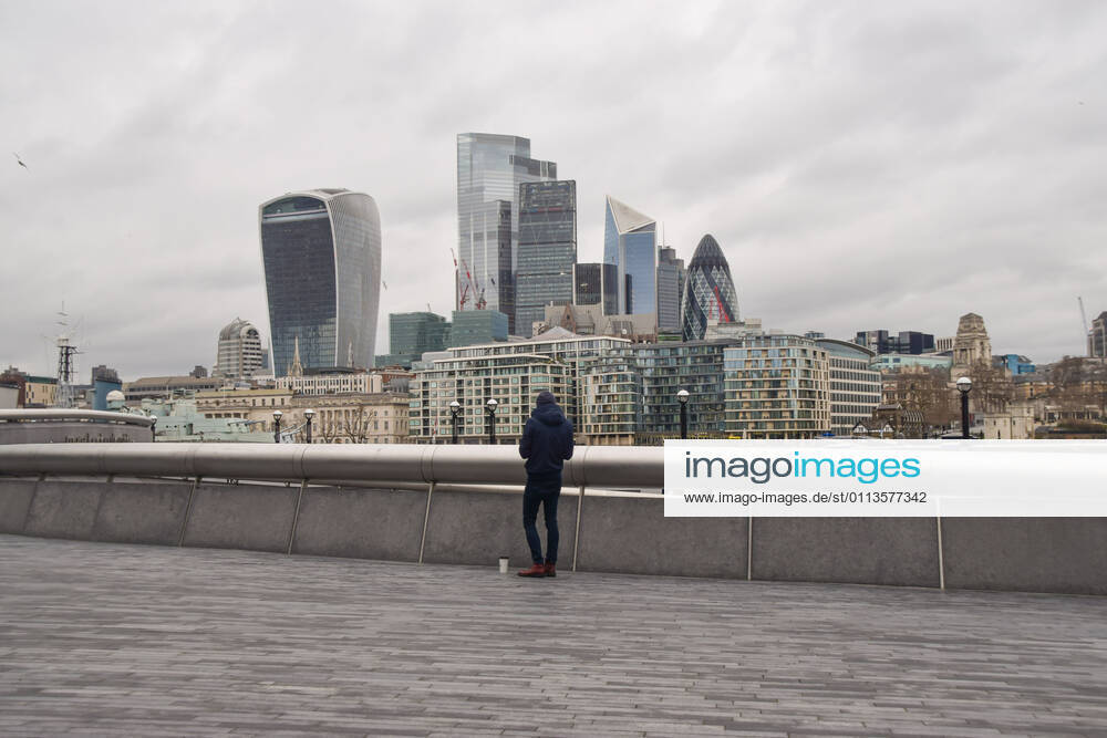 General view of the City of London as a man walks past amid the lockdown. London United Kingdom - ZUMAs197 20210219_zaa_s197_247